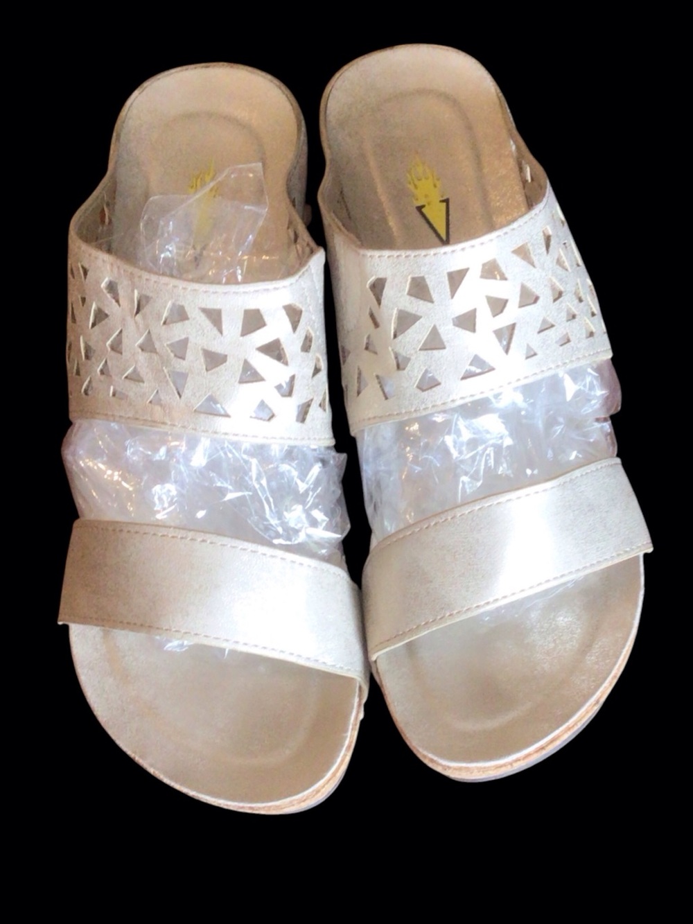 EUC....Womens Volatile wedges in muted gold .SZ 8
